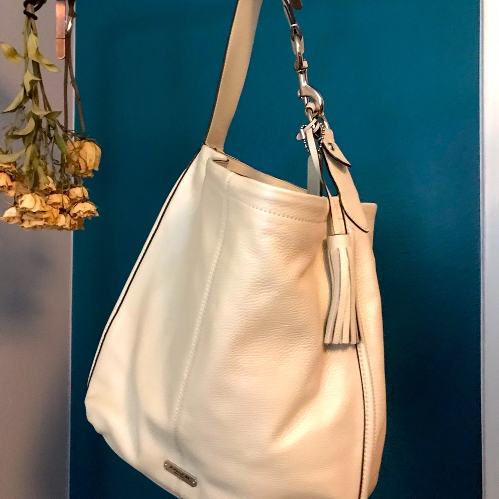 Beautiful, warm ivory, pebble leather purse by Coach. Shoulder carry. NWT.